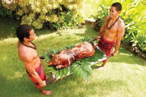 Kalua pig is one of the traditional foods found at every luau