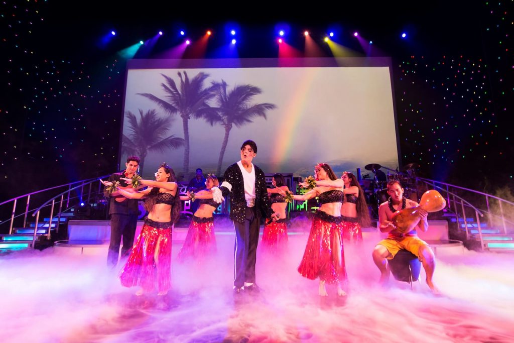 A Michael Jackson tribute artist performs onstage at Waikiki's Rock A Hula show.
