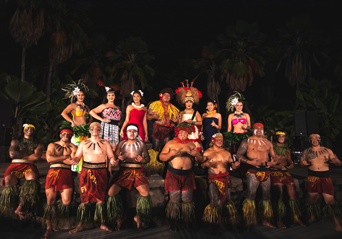 The Luau cast poses in full regalia in Oahu, Hawaii.