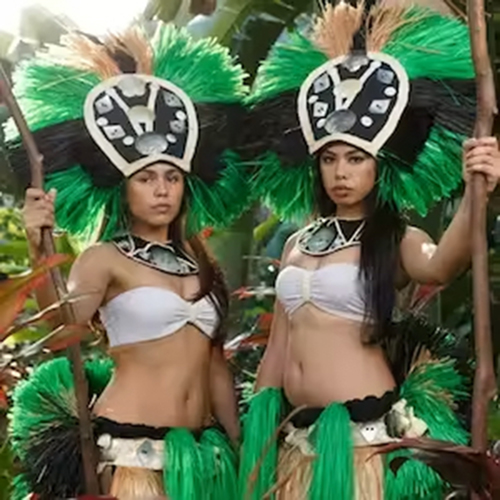 Dancers at Luau Kalamaku pose in costume at this unique Kauai Luau.