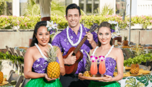 Luau staff pose for a promotional photo.
