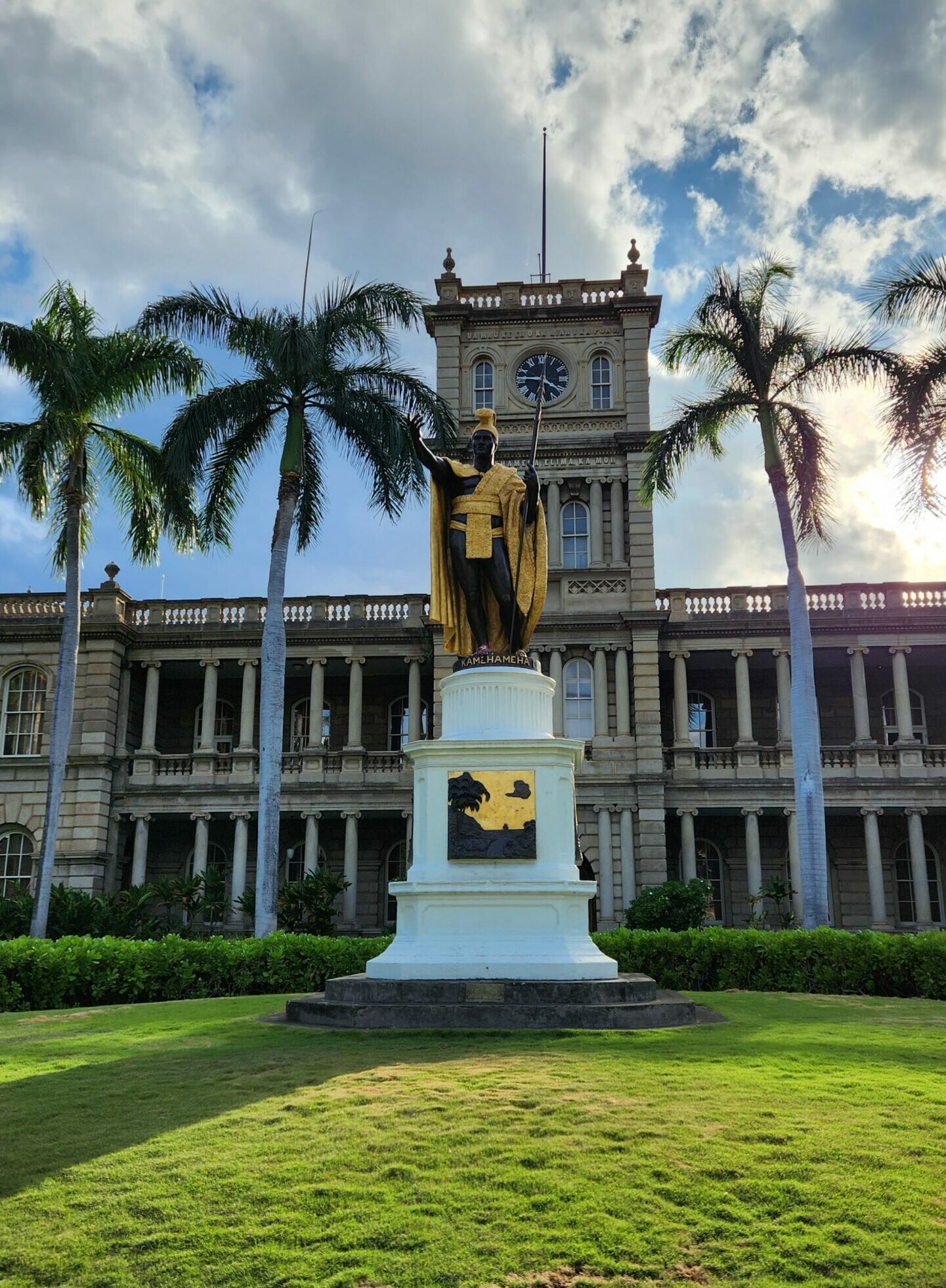 The King Kamehameha statue stand in front of the Hawaii State Supreme Court in Honolulu, Hawaii.